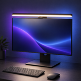 Monitor light bar on a desktop monitor in a charcoal setup with blue-violet accents
